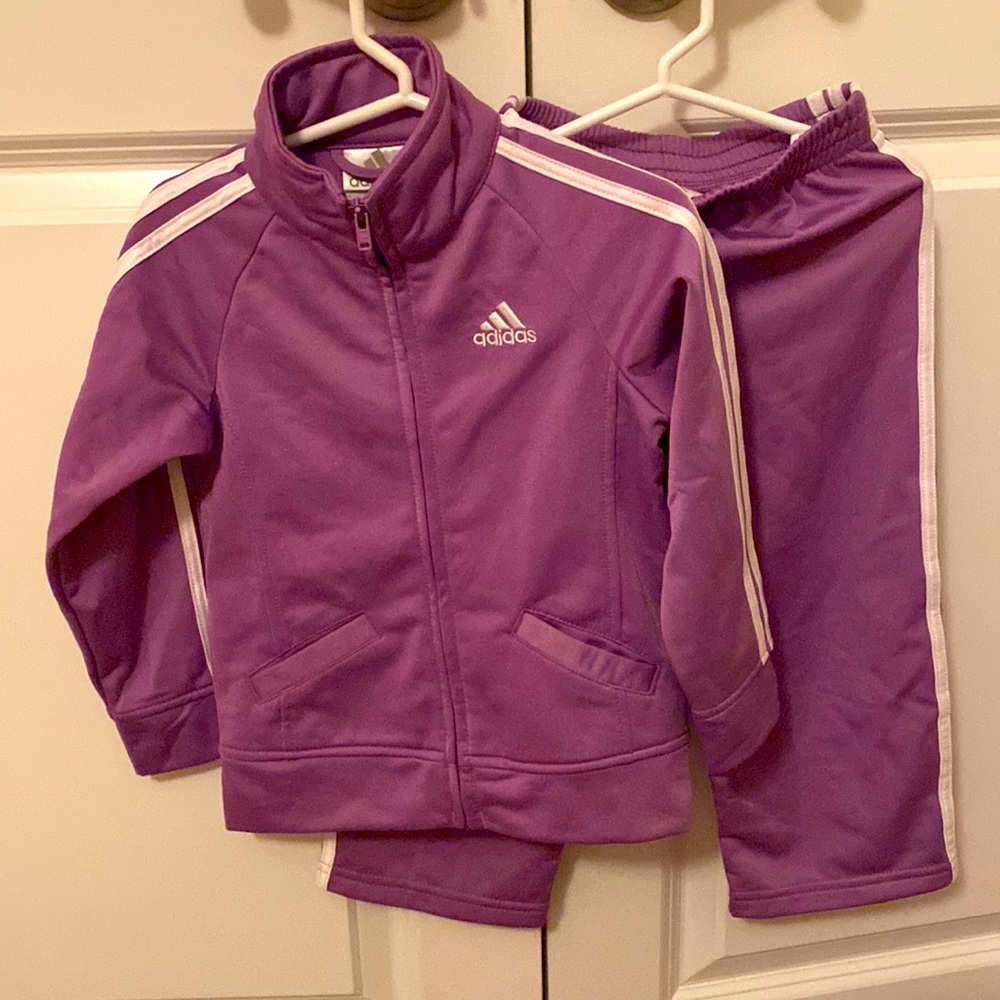 Adidas toddler girl purple track suit. New with tags on and never been worn.